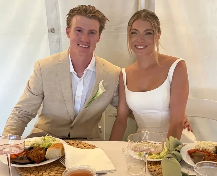 Couple smiling at formal dinner table
