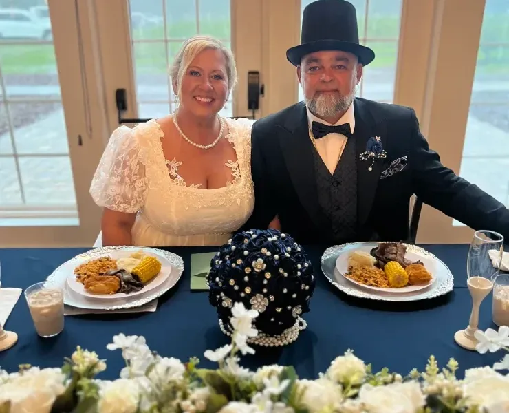 Elegant couple at formal dinner celebration