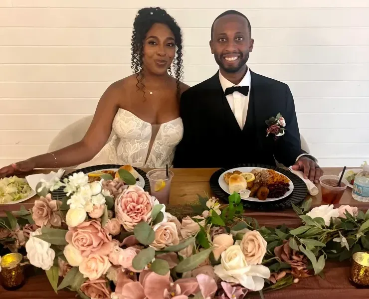 Couple at formal wedding dinner table